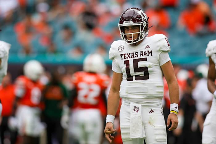 Sep 9, 2023; Miami Gardens, Florida, USA; Texas A&M Aggies quarterback Conner Weigman (15) looks on against the Miami Hurricanes during the first quarter at Hard Rock Stadium. Mandatory Credit: Sam Navarro-USA TODAY Sports